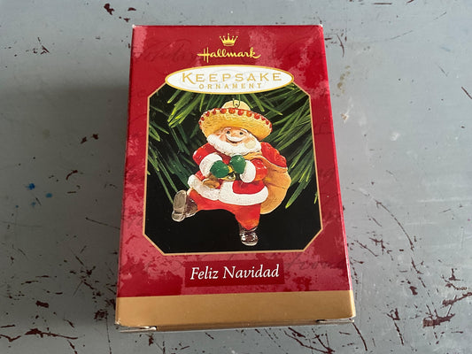 Hallmark Feliz Navidad 1999. Santa Keepsake ornament. QX6999