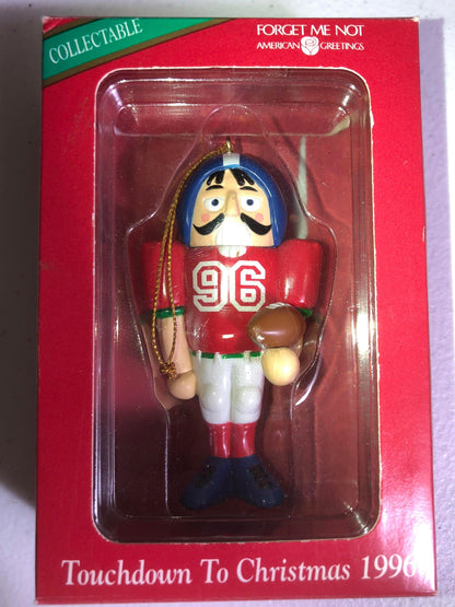 American Greetings Nutcracker Touchdown to Christmas Dated 1996 Forget Me Not Ornament