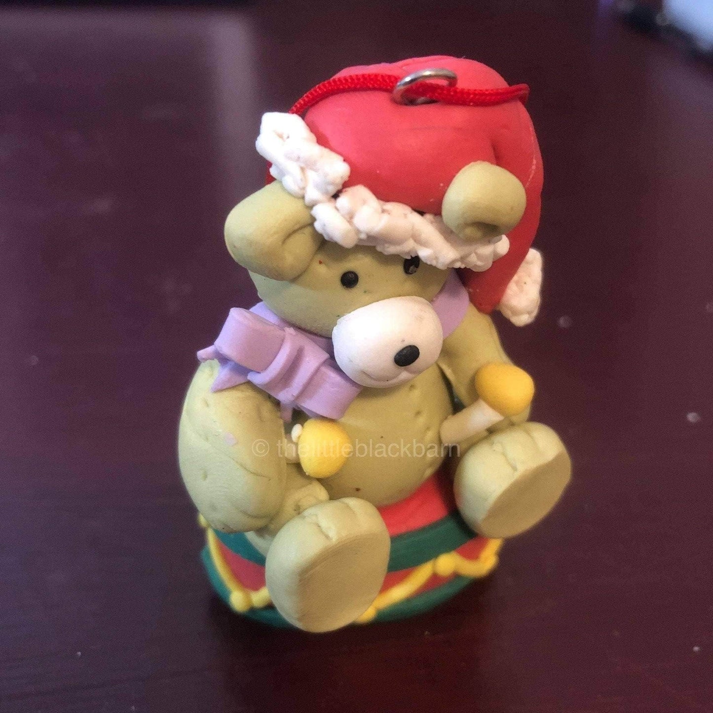 Bear with Santa Cap, Sitting on a Drum, Christmas Ornament