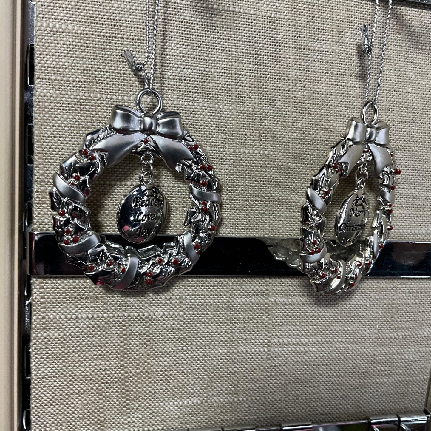 Wonderful wreaths set of 2 silver-tone with dangling Merry Christmas and Peace on Earth ornaments