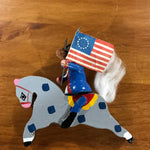 Mini Wooden figure riding horse holding a flag