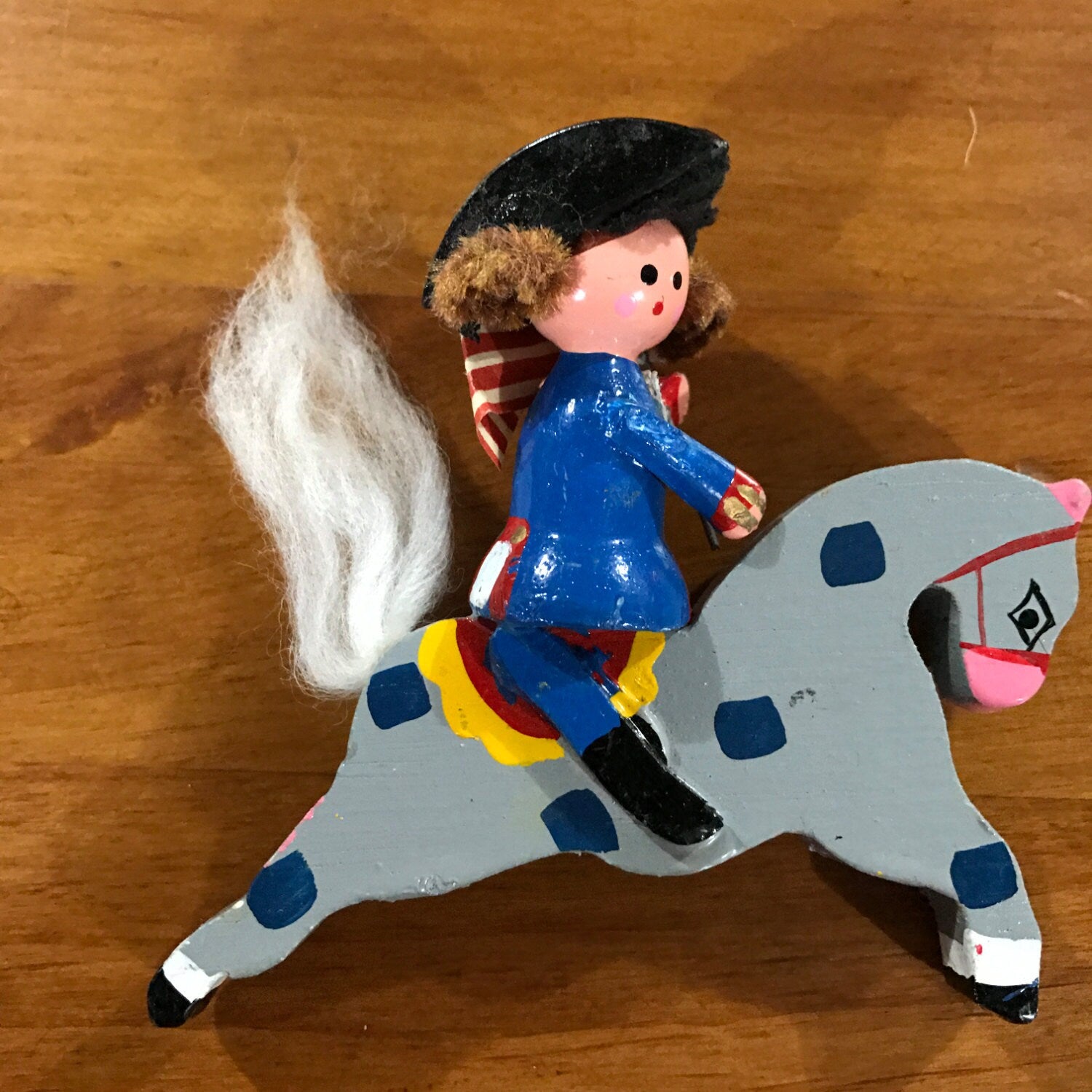 Mini Wooden figure riding horse holding a flag