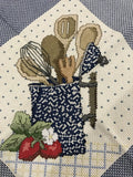 Completed counted cross stitch design crock holding kitchen utencils