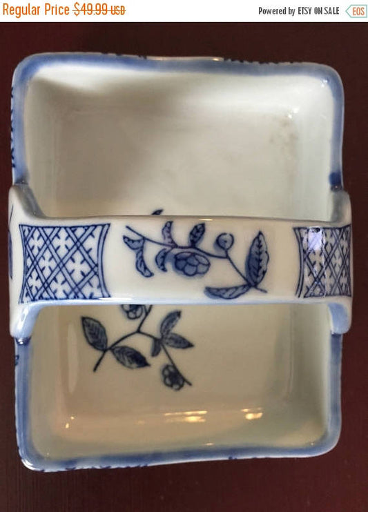 Stone pottery basket with floral pattern in beautiful blue print