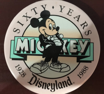 Disneyland pin depicting Mickey Mouse in tux and sneakers, commemorating sixty years 1928-1988, vintage collectible