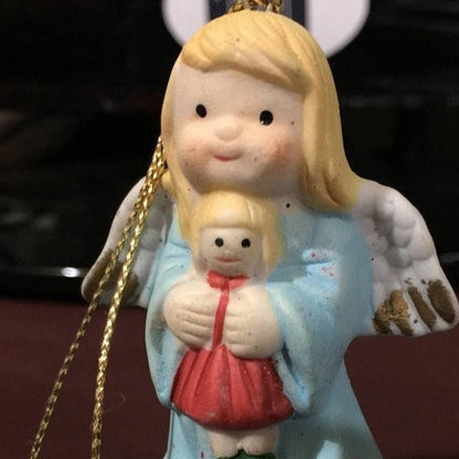 Porcelain Little Angel holding doll Vintage 1996 Ornament