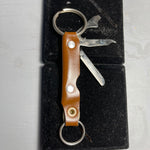 Leatherette Double Keyring with Folding Pocket Knife, Nail File, Bottle Opener, and Screwdriver inside, Vintage Collectible Tool