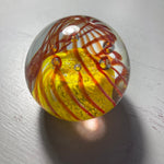 Phenomenal Paper Weight Amber Wavy Lines Set Against Yellow Ball Vintage Collectible Eclectic Decor