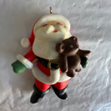 Russ Santa Clause Holding A Teddy Bear Ornament