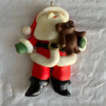 Russ Santa Clause Holding A Teddy Bear Ornament