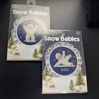 Leisure Arts Snow Babies Set of 2 Slipping and Sliding and It's Snowing! Counted Cross Stitch Kits