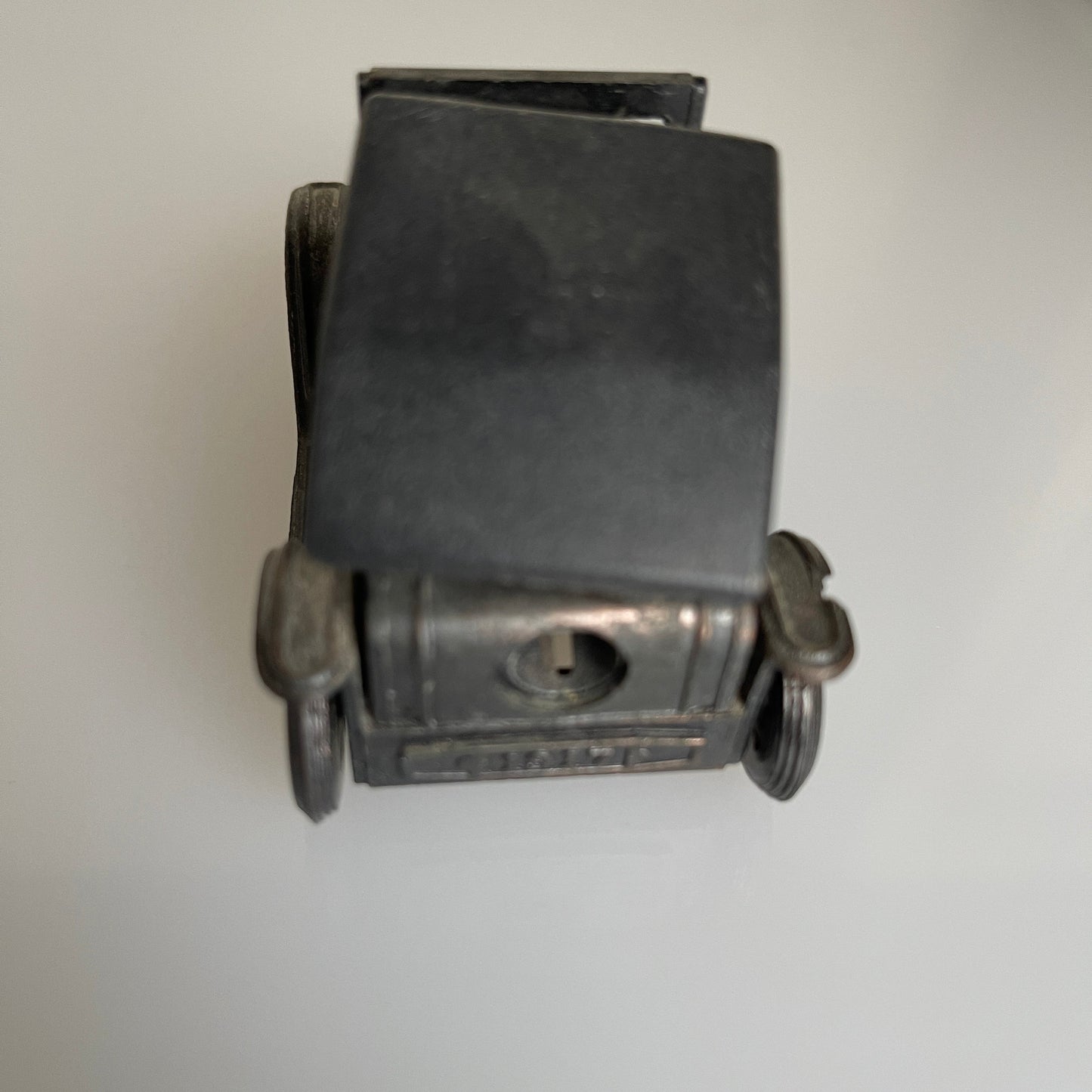 Antique motor car style vintage die-cast metal pencil sharpener