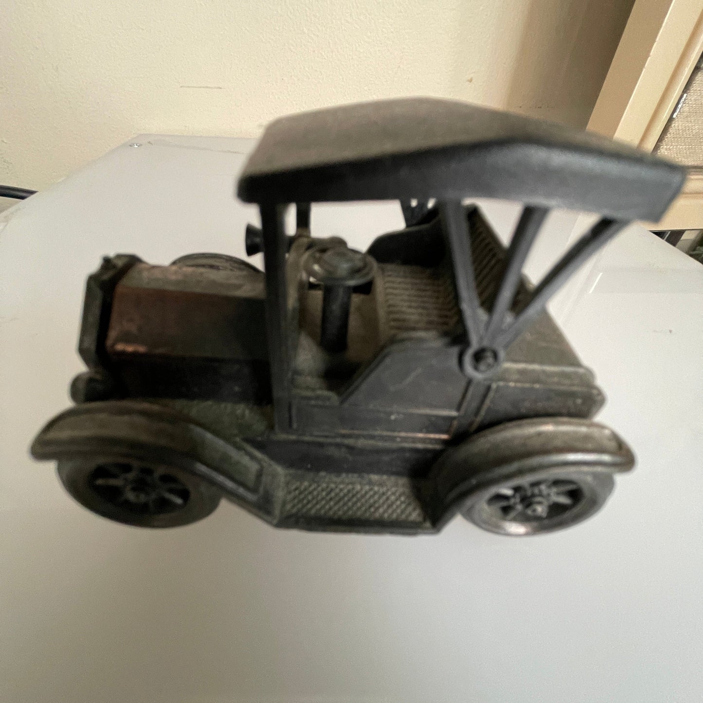 Antique motor car style vintage die-cast metal pencil sharpener