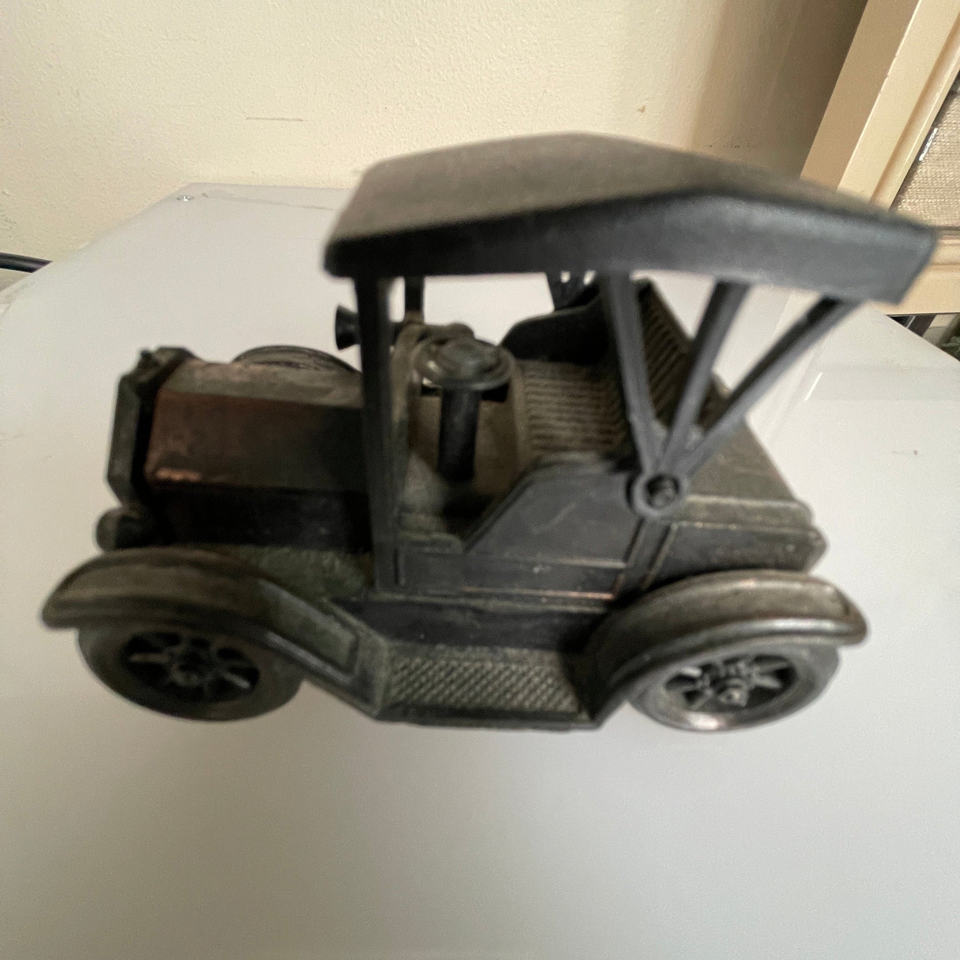 Antique motor car style vintage die-cast metal pencil sharpener