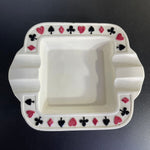 Playing card suits are raised and surround this unique vintage trinket dish/ashtray