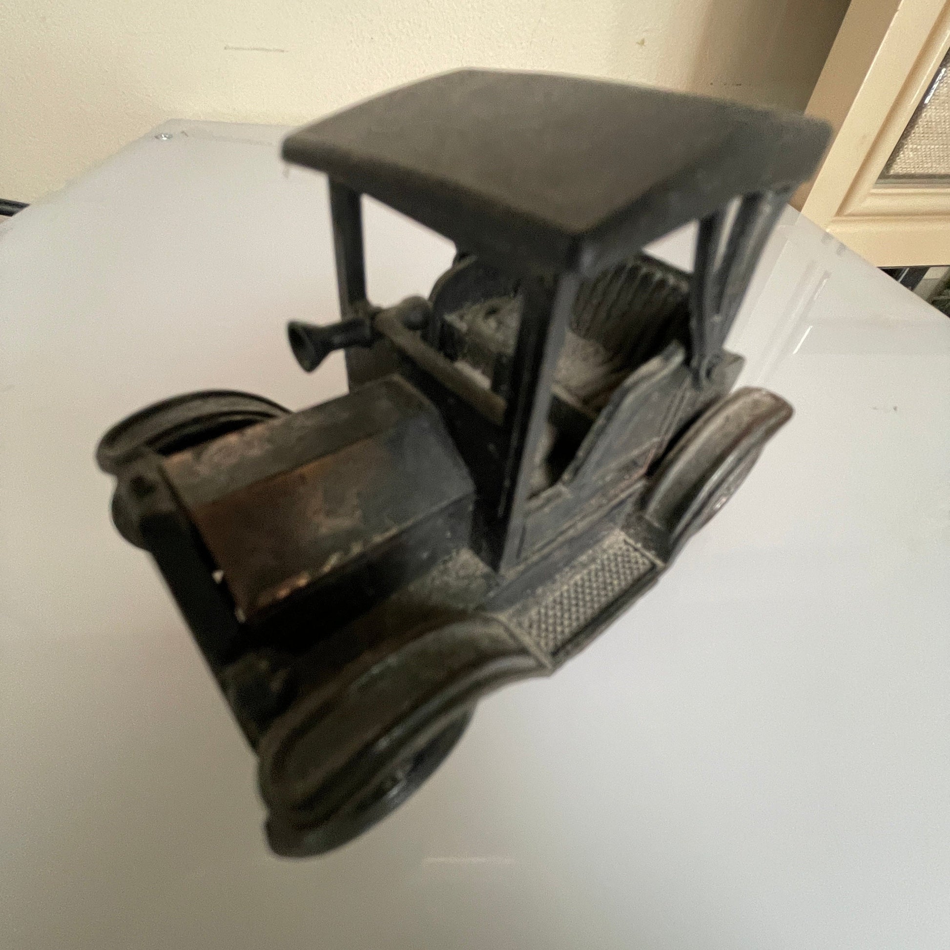 Antique motor car style vintage die-cast metal pencil sharpener