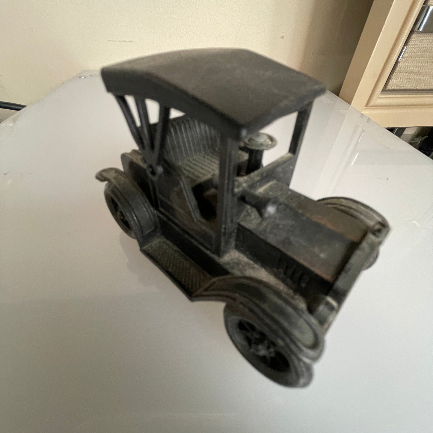 Antique motor car style vintage die-cast metal pencil sharpener