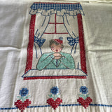 Little girl saying her prayers in front of a beautiful window vintage hand embroidered tea towel