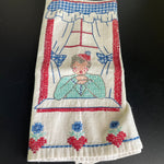 Little girl saying her prayers in front of a beautiful window vintage hand embroidered tea towel