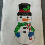 Snowman in top hat and scarf holding a candy cane front & back needlepoint canvas 6 by 3 inches