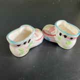 Precious porcelain pair of  baby booties  witj pink bows and blue trim vintage collectible figurines