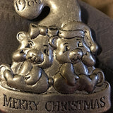 Merry Christmas Silver Tone Ornament Featuring a boy and girl bear, Vintage 1986