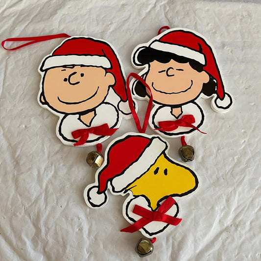 Kurt Adler Peanuts Gang Choice Of Charlie Brown, Lucy, or Woodstock with Metal Jingle Bell Wooden Christmas Ornaments