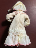 Baby Doll Holding Candle and Stocking, Vintage Christmas Ornament