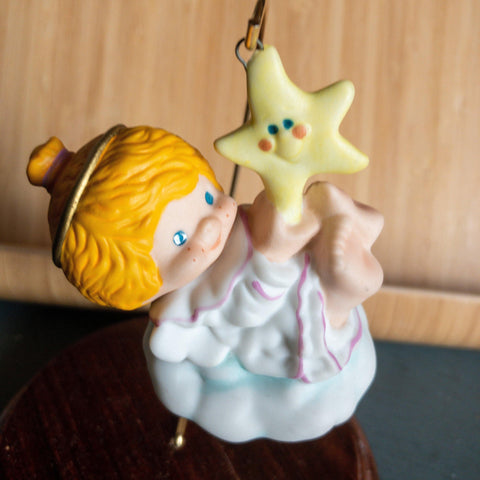 Baby Angel on a Cloud Holding a Star, Porcelain Ornament